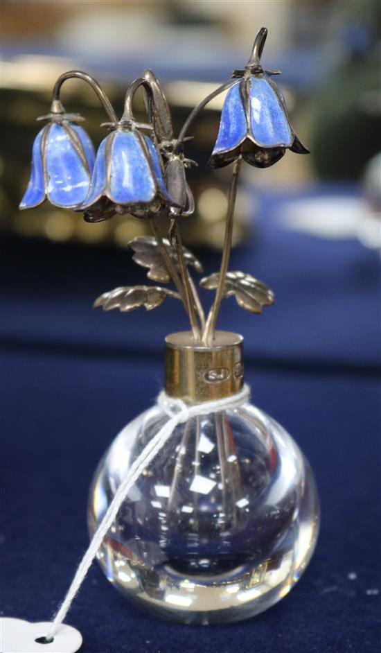 A silver and blue enamel mounted glass flower ornament, 10cm